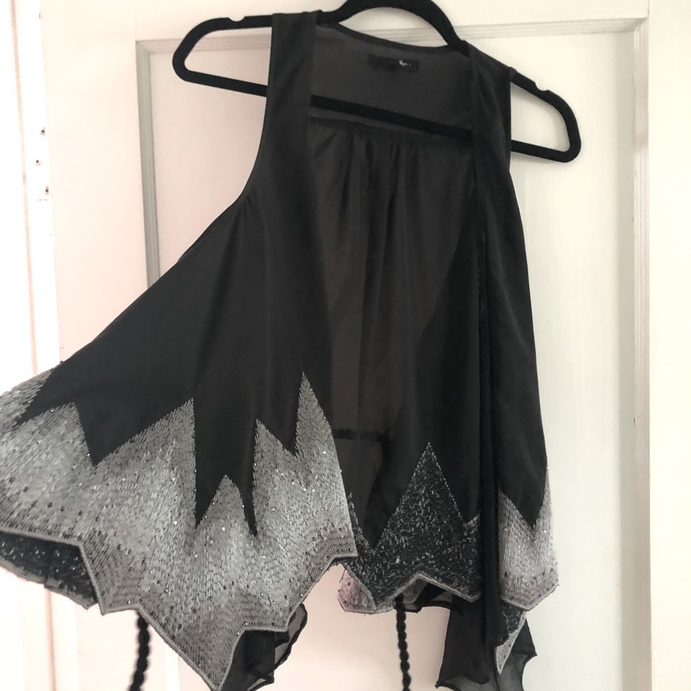 Stunning black belted vest with woven bead detail